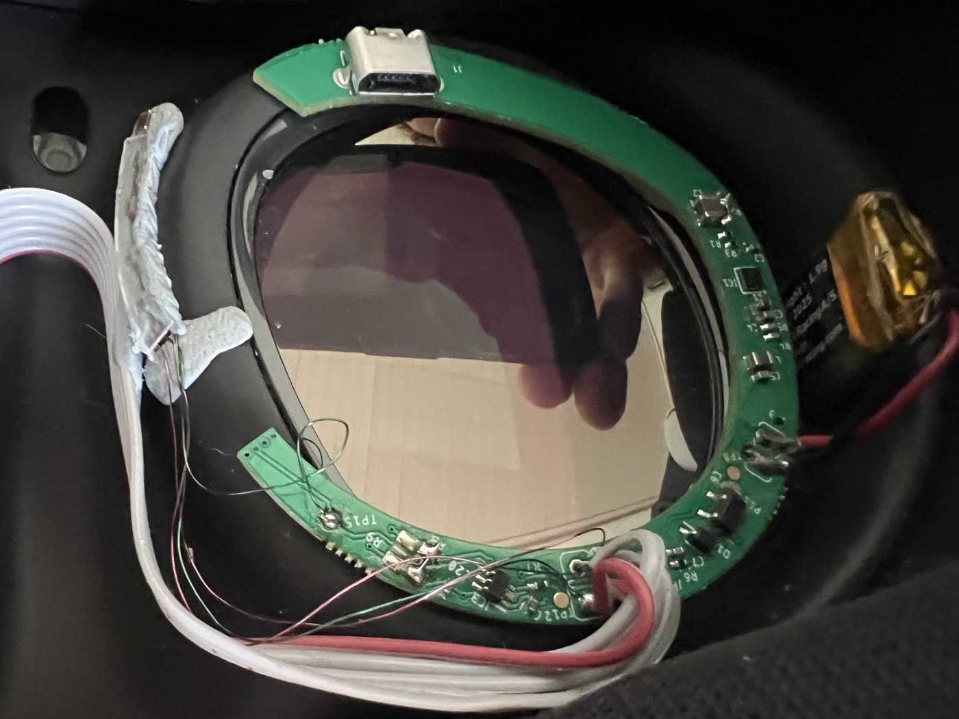 Close view of curved circuit boards and LED strips inside the working Sigrist XR prototype